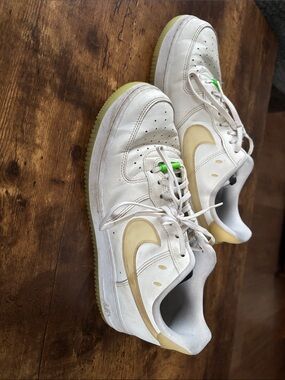 Nike Kids White Sneakers with Pale Yellow Swoosh